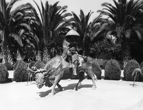 Statue of Ten-Jin on his ox