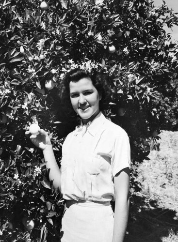 Woman with orange blossoms