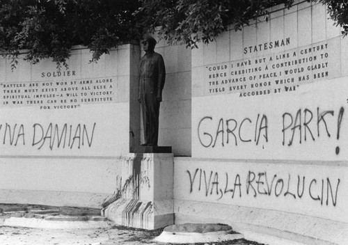 MacArthur statue covered with graffiti