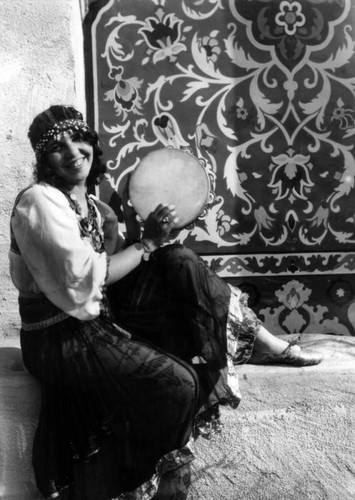 Tambourine player at the Exposition
