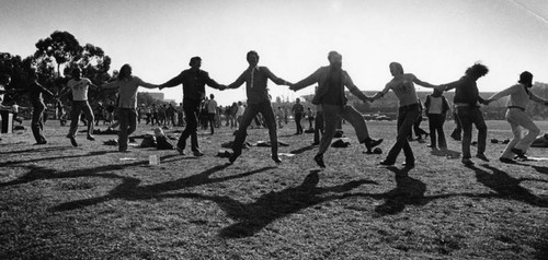 Dancing at male violence protest