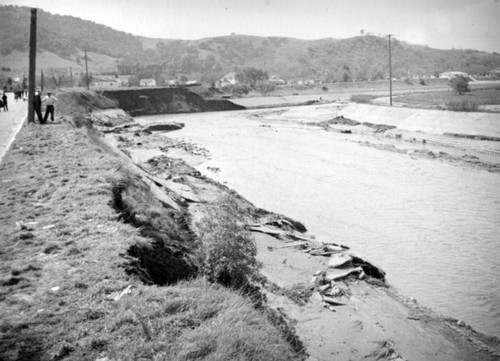 L.A. River flooding, destruction in a river channel, Universal City