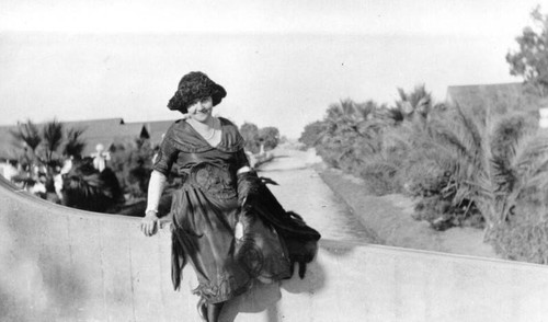 Nicely dressed woman at the Canal