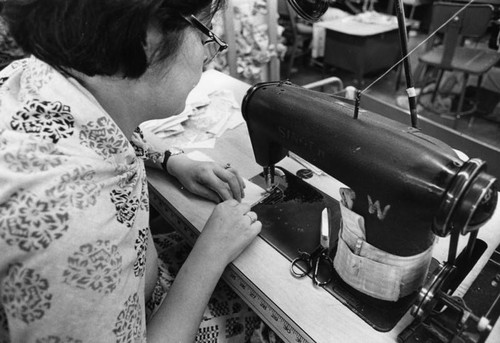 Garment worker sewing