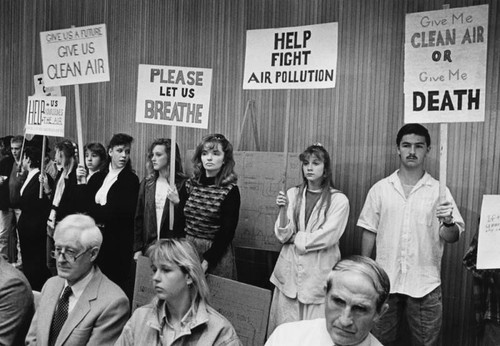 Smog protestors at meeting