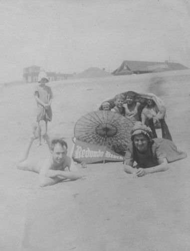 Lying on the sand in Redondo Beach