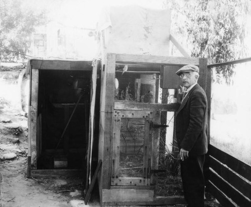 Man with birdcage