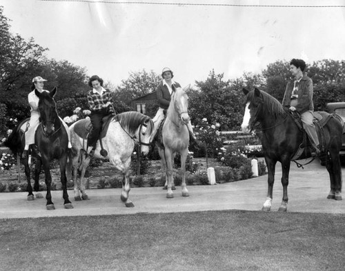 Garden clubbers on horseback