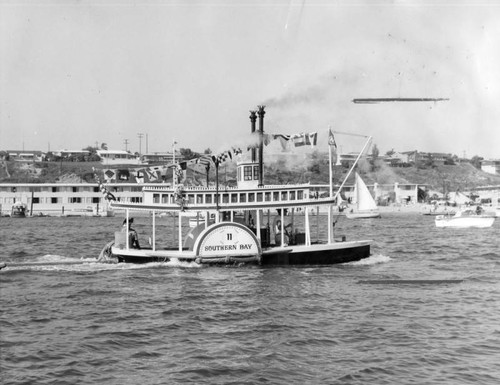 Miniature Mississippi river boat stands out in Balboa Bay parade