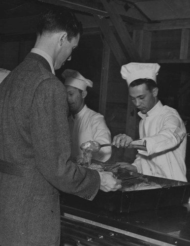 Actor Jimmy Stewart at Fort MacArthur mess hall during Army induction