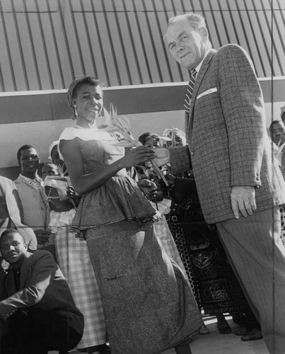 Dancer Aissatou Manasare accepts flower from Pacoima