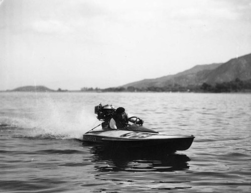 "Shamrock" motorboat on beach, view 3