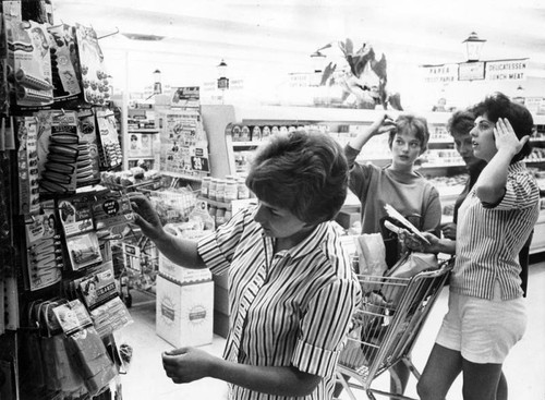 Joyce and Barbara add curlers to groceries