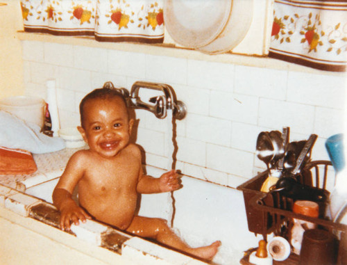 Boy taking a bath