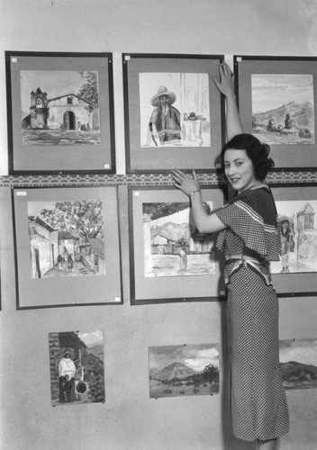 Maria Elena Ochoa with Mexican art exhibit