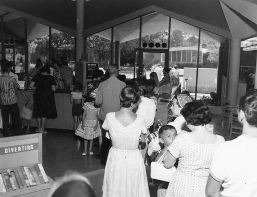 Checking books out, Canoga Park Branch, view 1