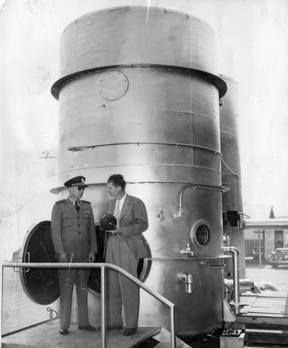 Capt. O.A. Weller inspects chamber