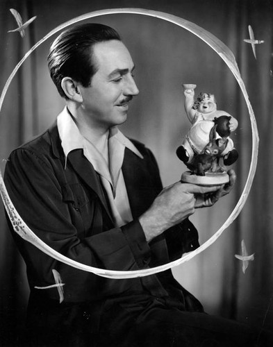 Walt Disney with "Fantasia" figurine