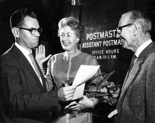 Kay Bogendorfer, postmaster, being sworn in