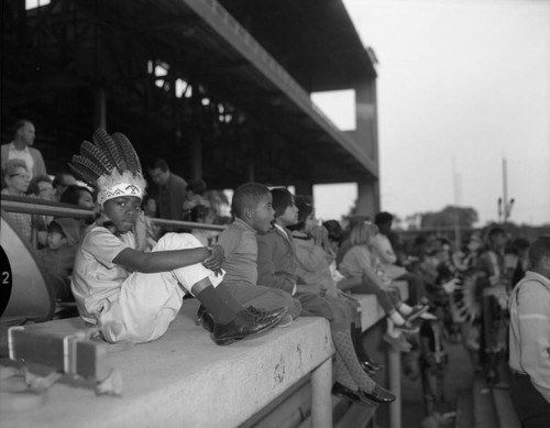 Children enjoying the 2nd annual All American Indian Week performances at Wrigley Field