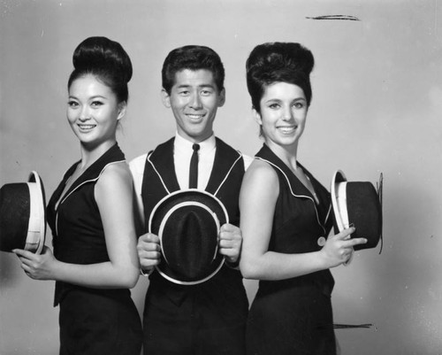 Dancers holding hats