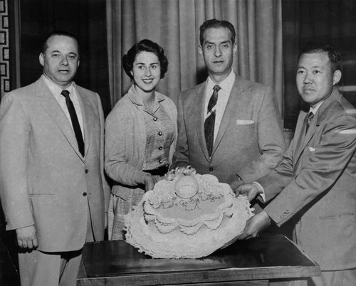 Cake presented to two councilmen