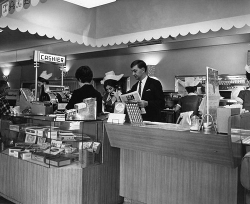 Cashier inside Van de Kamp's