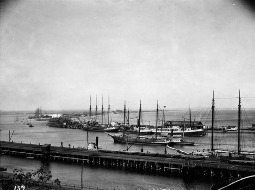 Ship hauls lumber through harbor