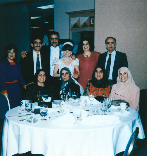 Bride and groom with guests