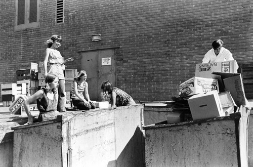 Manson Family scavenging behind supermarket