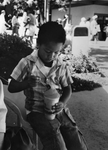 Young boy with refreshment