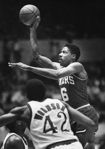 Dr. J goes for the basket