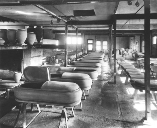 Funeral caskets & urns displayed