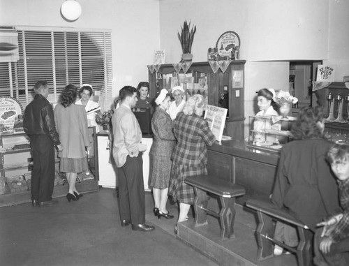 Currie's Ice Cream employees serving customers