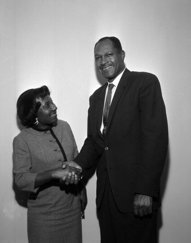 Councilmember Tom Bradley with unidentified woman