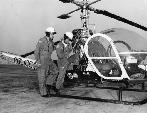 Police helicopter and pilots