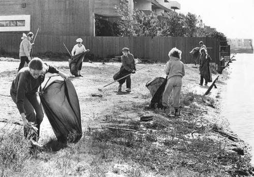 Residents participate in the cleanup of the Venice Canal