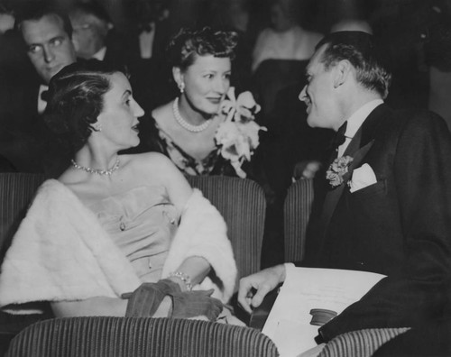 Douglas Fairbanks Jr. and his wife, Mary Lee with Irene Dunne at the Academy Awards