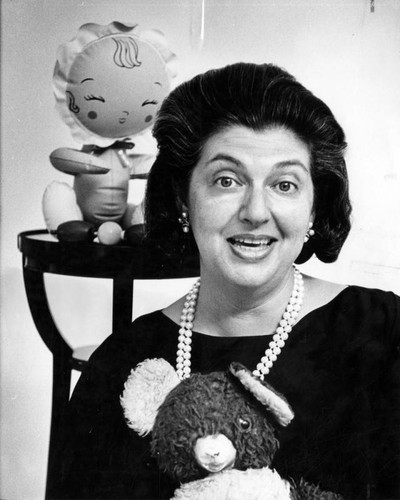 Mrs. Leo Hirsh with clinic therapy dolls