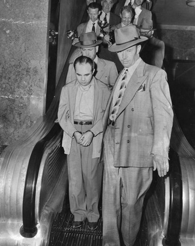 Mickey Cohen in handcuffs