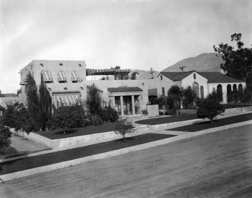 House with large striped awnings, Burbank