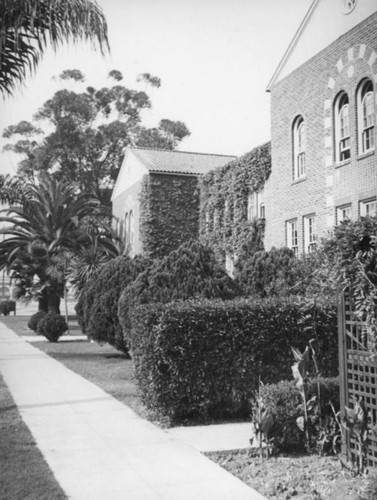 Sidewalk and campus buildings at Chapman College