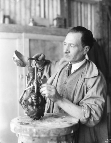 Sculptor casting a mold