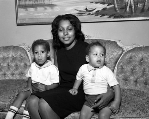 Unidentified woman and children