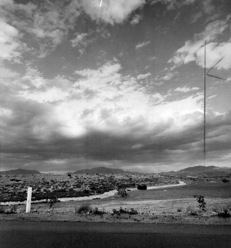 Gray clouds hang over Hansen Dam in Pacoima