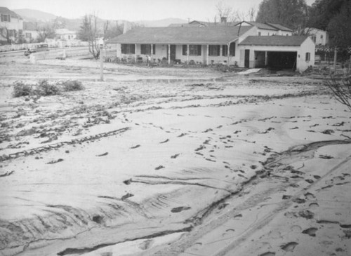 L.A. River flooding, mud everywhere in North Hollywood