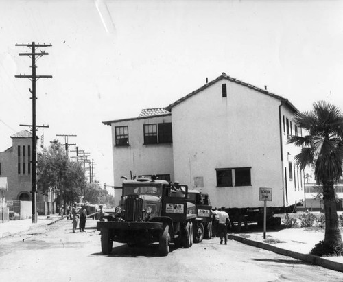 House moved to make way for school