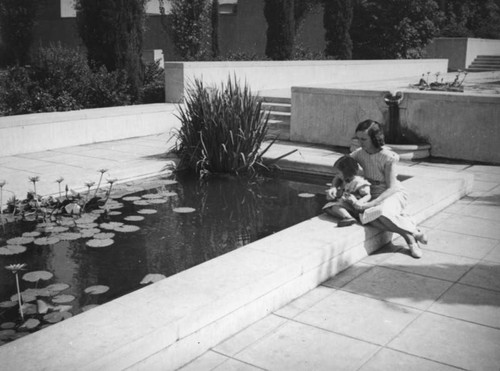 Enjoying the reflecting pools at Central Library