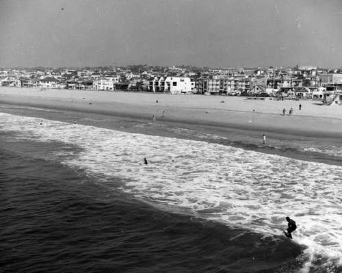 Board surfing at Hermosa Beach, view 1