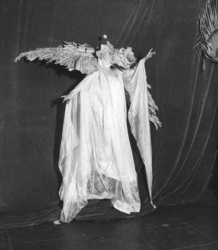 Actress in costume, posed